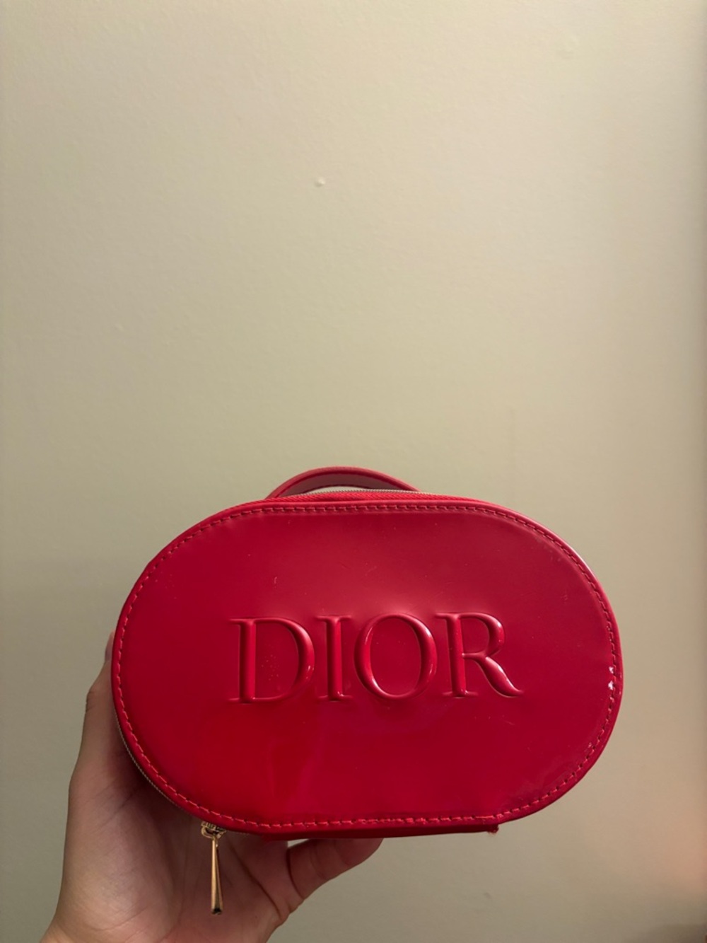 Dior Red Patent Oval Cosmetic Case with Embossed Logo